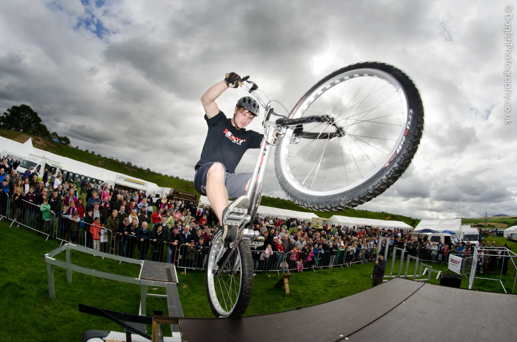 3SIXTY rider performing above a crowd at an outdoor show